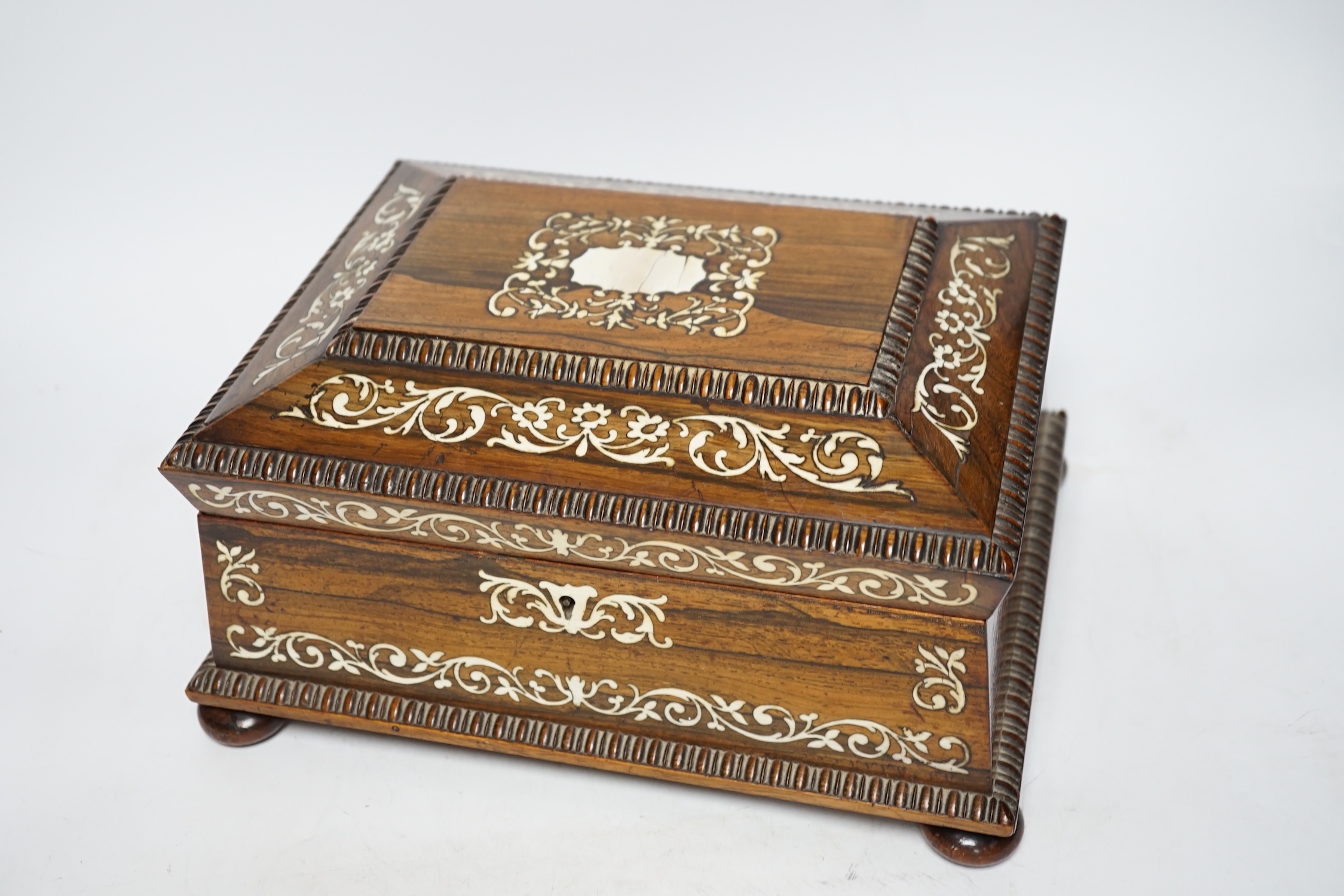 A William IV ivory inlaid rosewood work box, containing a fitted interior with lift out tray, 28.5cm wide, 22cm deep, 14.5cm high CITES Submission reference KBLFMJRS